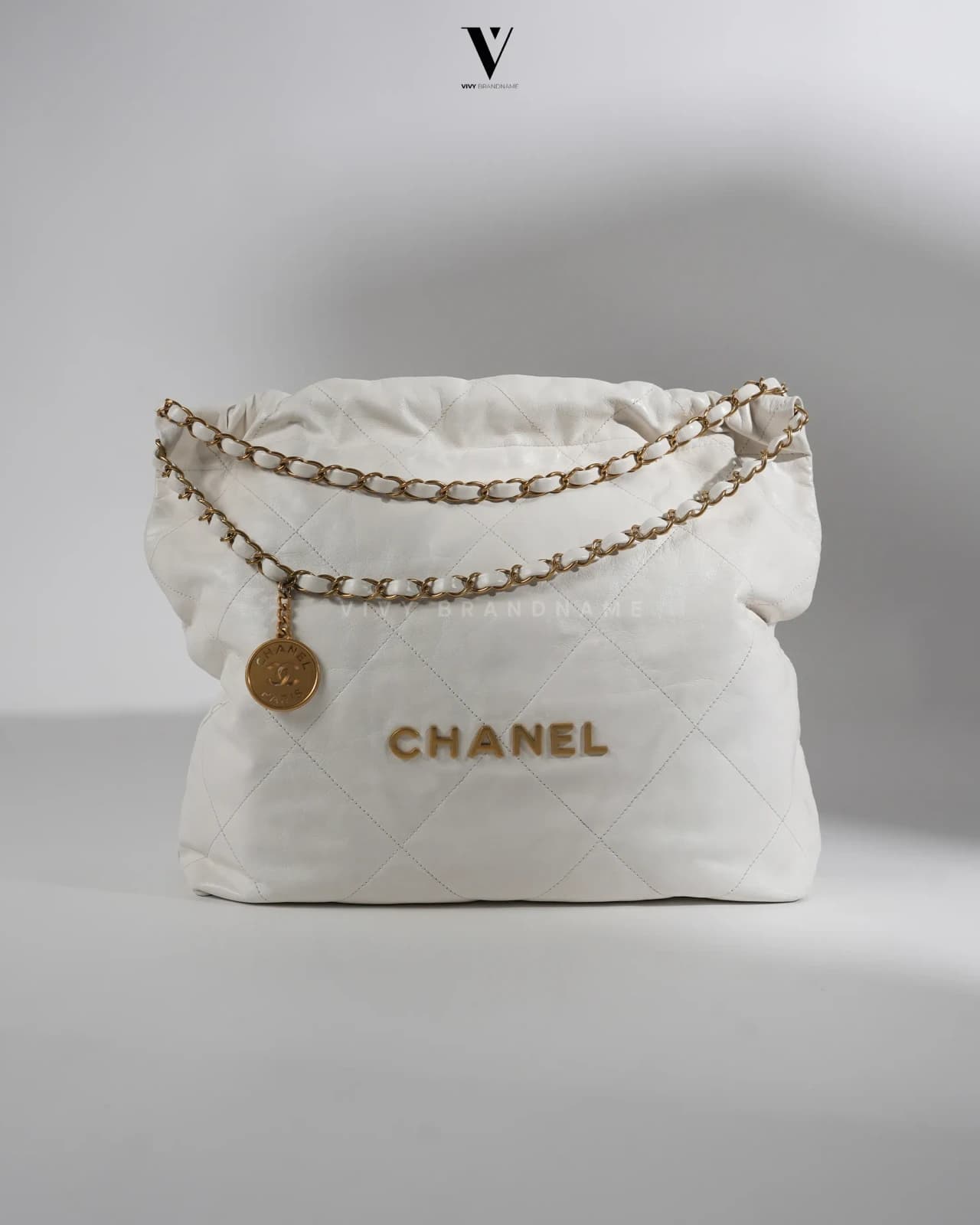 Chanel 22 — 22 white medium lamb GHW MCC