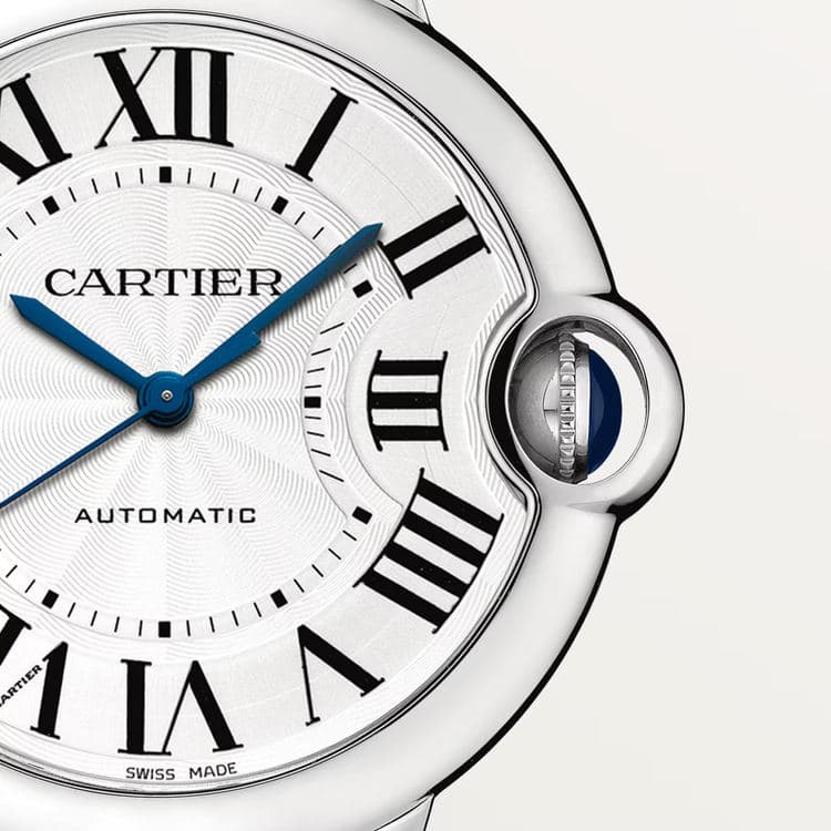 Close-up of the Cartier Ballon Bleu dial and blue crown