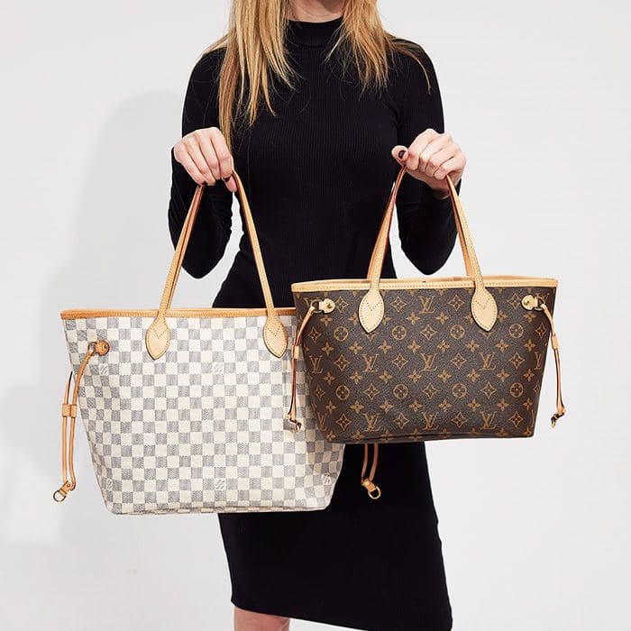 Woman holding Louis Vuitton Neverfull totes in Damier Azur and Monogram