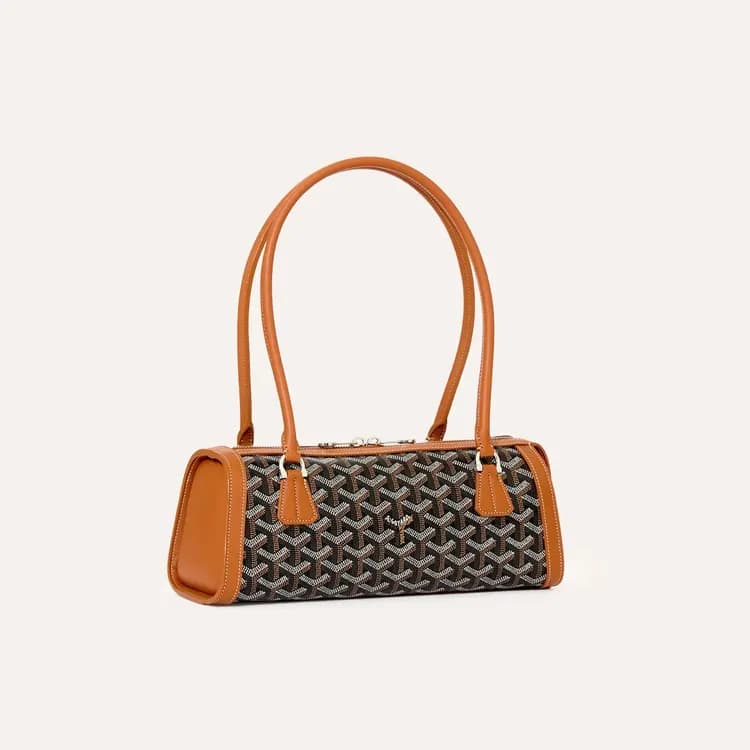 Black and brown Goyard Bonbonnière bag with tan handles
