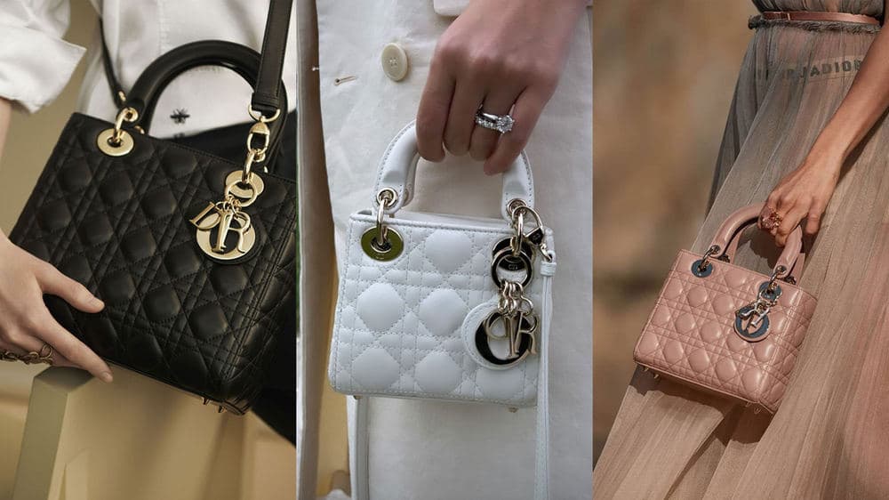 Black, white, and pink Lady Dior bags carried at models' sides