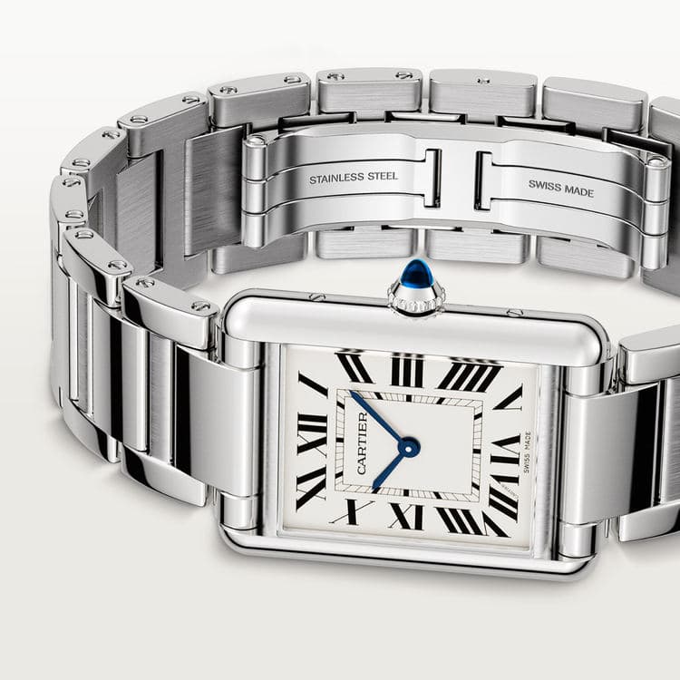 Angled close-up of a steel Cartier Tank Must watch and bracelet