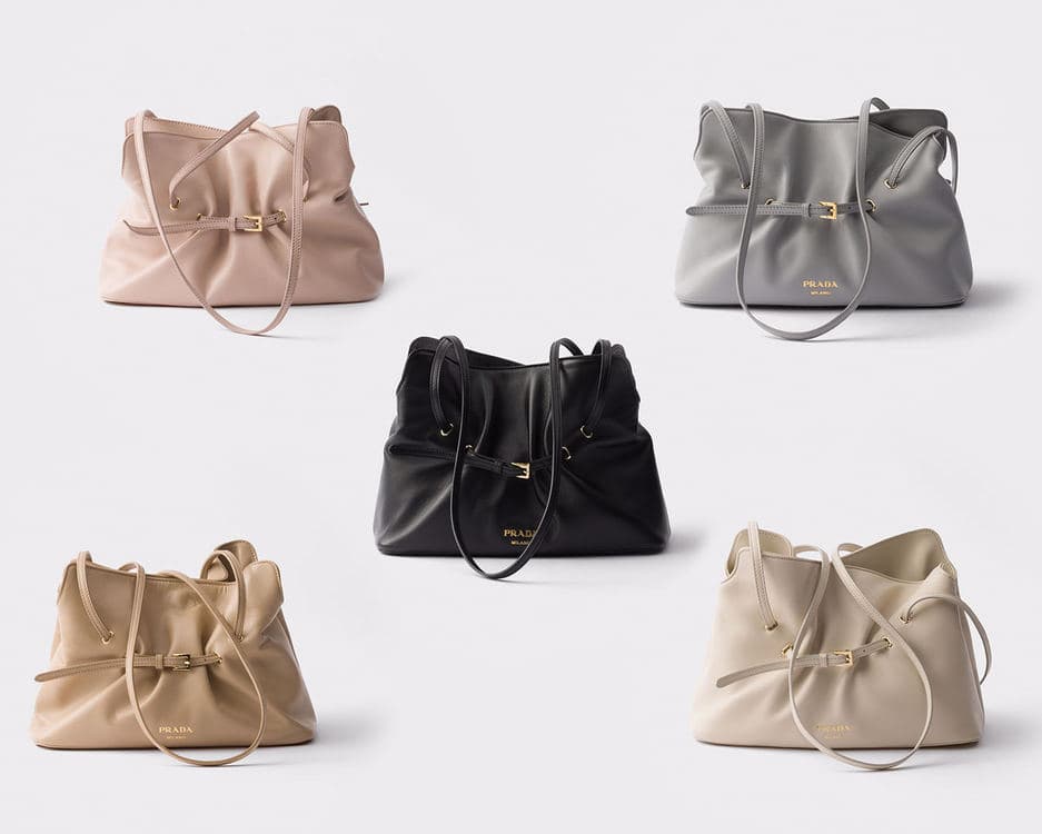 Five Prada Dada bags arranged in blush, grey, black, tan, and cream