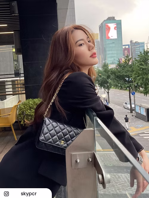 Sky styling a luxury handbag from Vivy Brandname